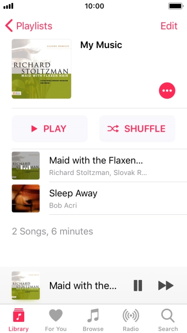 Press the song title at the bottom of the screen.