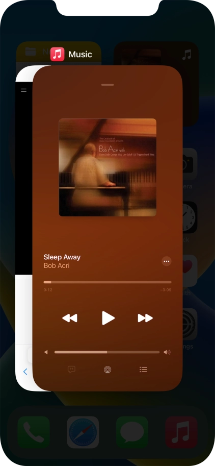 Slide upwards on the required application to end it.