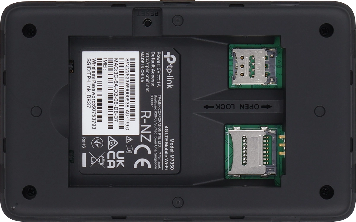 Slide the cover for the SIM holder right and open it.