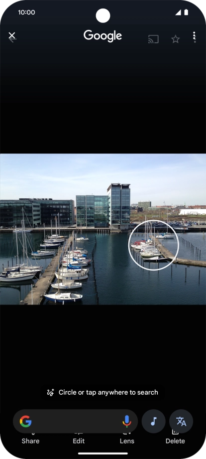 Draw a circle around the required object on the picture and wait for the search results.