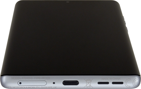 Insert the opener into the small hole in the SIM holder.