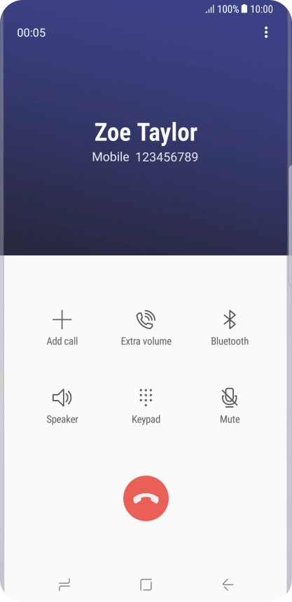 Press the end call icon.