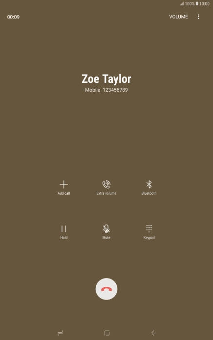 Press the end call icon.