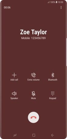 Press the end call icon.