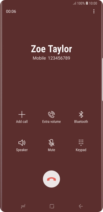 Press the end call icon.