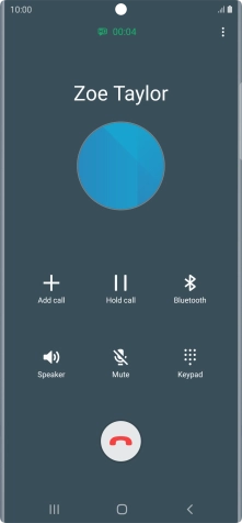 Press the end call icon.