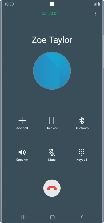 Press the end call icon.