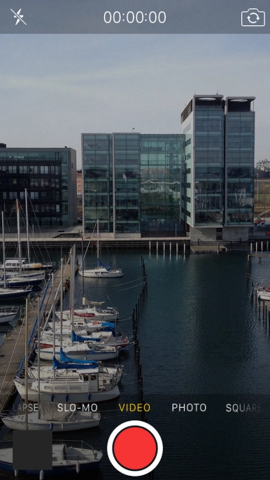 Slide your finger right or left on the screen to select PHOTO.