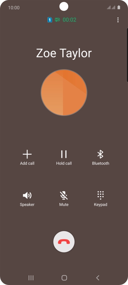 Press the end call icon.