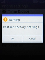 Press the Left selection key. Wait a moment while the factory default settings are restored. Follow the instructions on the screen to set up your phone and prepare it for use.