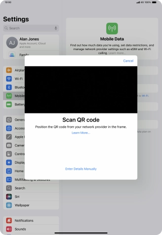 Place the QR code you've received inside the tablet camera frame to scan the code.