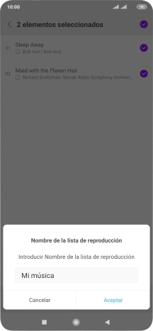 Introduce el nombre deseado de la lista de reproducción y pulsa Aceptar. Introduce el nombre deseado de la lista de reproducción y pulsa Aceptar.