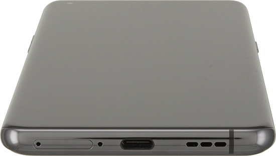 Introduce la herramienta de apertura en el orificio del contenedor de la tarjeta SIM.