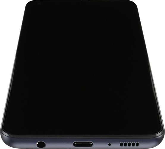 Conecta el cargador al conector y enchúfalo a una toma de corriente.