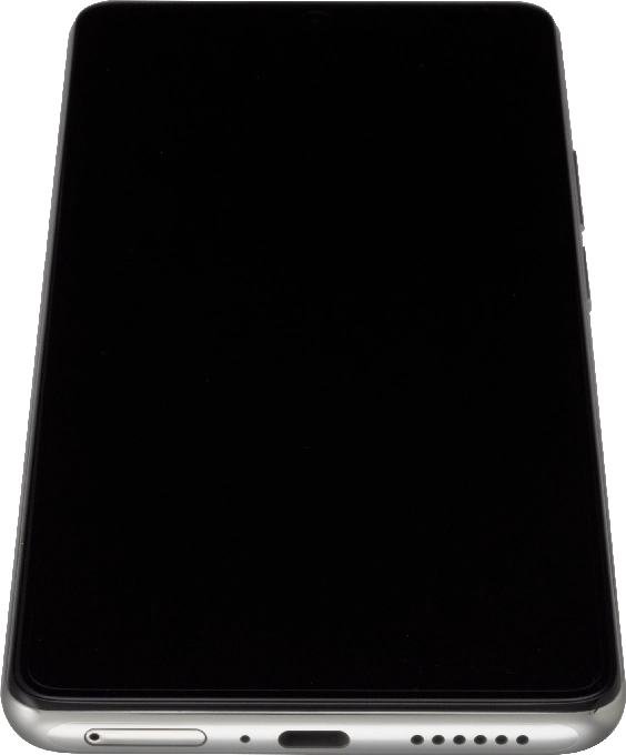 Conecta el cargador al conector y enchúfalo a una toma de corriente.