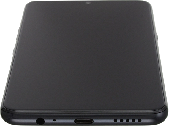 Conecta el cargador al conector y enchúfalo a una toma de corriente.