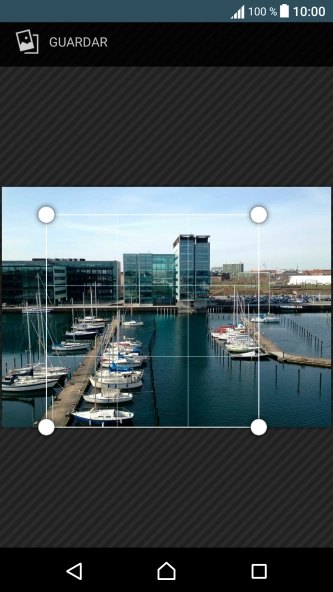 Arrastra el marco a la posición deseada para seleccionar la sección que debe aparecer y pulsa GUARDAR.