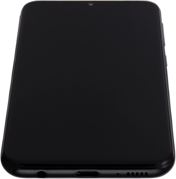 Conecta el cargador al conector y enchúfalo a una toma de corriente.