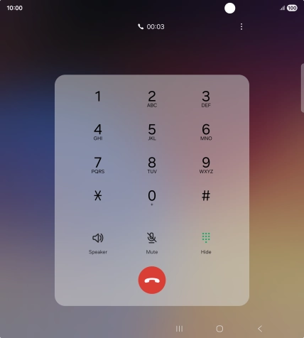 Press the end call icon.