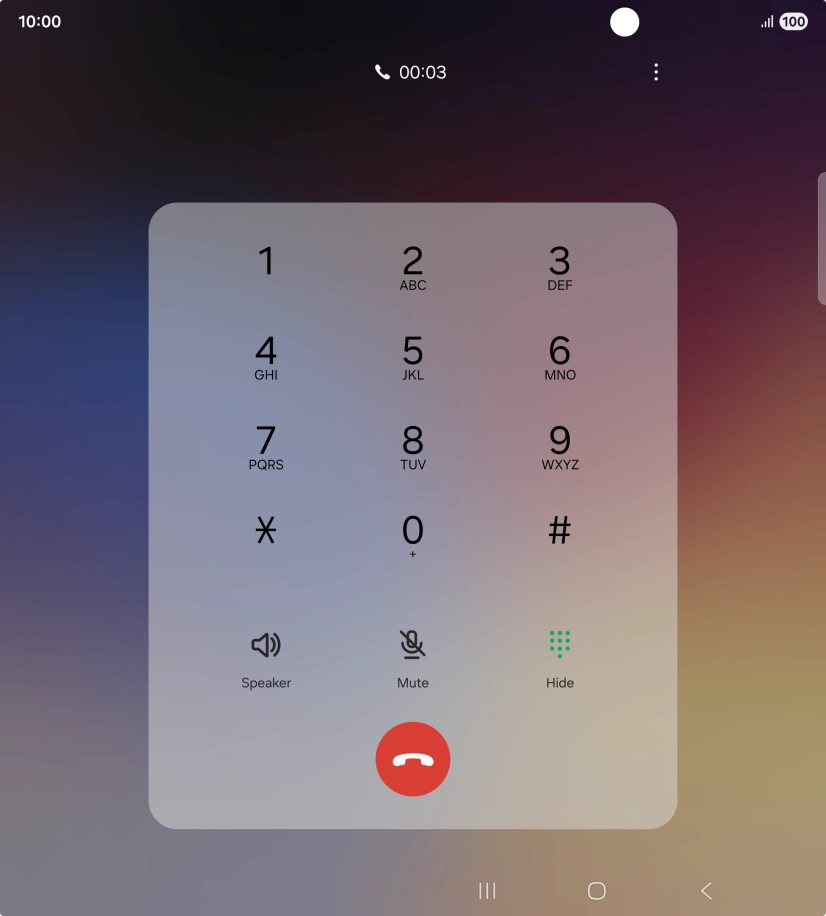 Press the end call icon.