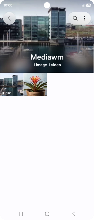 Press and hold any picture or video. Press and hold any picture or video.