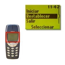 Vaya a Restablecer y pulse Seleccionar.