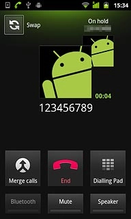 Your calls are displayed at the top of the display and the call on hold is indicated by On hold.