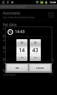 Press + or - next to hours and minutes to set the time.