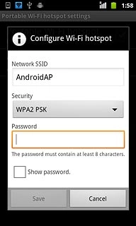 Press the field below Password and key in a password (minimum length of eight characters).