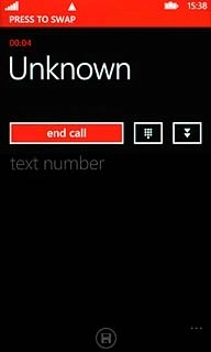Press PRESS TO SWAP to swap calls.