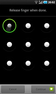 Press and drag a point to connect at least four points to select a new phone lock code.