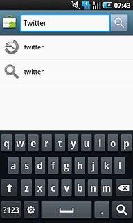 Key in Twitter and press the search icon.