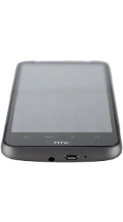 Connect the charger or data cable to the phone socket and to a wall socket or your computer's USB port.