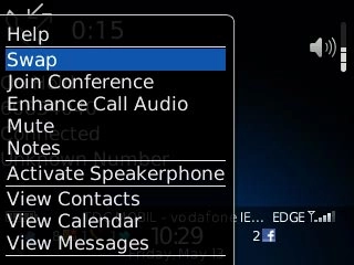 Scroll to Swap and press the Navigation key to swap calls.