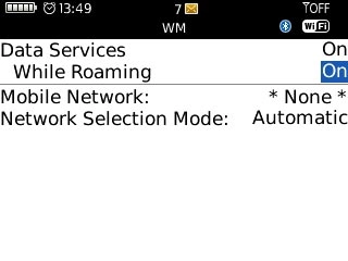 Highlight the drop down list next to While Roaming and press the Navigation key.