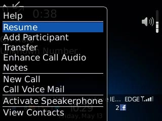 Scroll to Resume and press the Navigation key to resume the ongoing call.