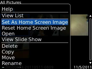 Scroll to Set As Home Screen Image and press the Navigation key.