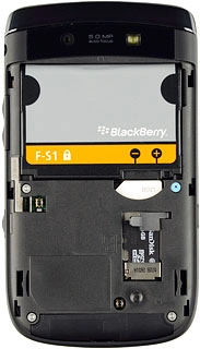 Turn the memory card as illustrated in the memory card holder.Slide the memory card into place the holder.