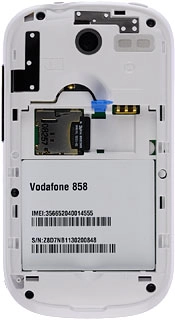 Slide the memory card into the holder and press it until it clicks into place.