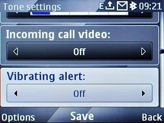 Scroll to Vibrating alert and press Navigation key right to select On or Off.