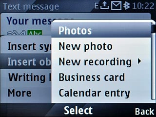 Scroll to Photos and press the Navigation key.