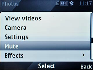 Scroll to Mute or Unmute (depending on the current setting) and press the Navigation key.