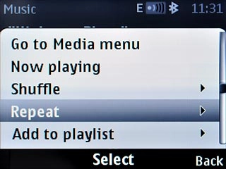 Scroll to Repeat and press the Navigation key.
