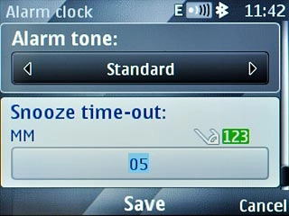 Scroll to Snooze time-out and key in the required number of minutes.
