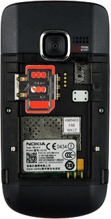 Open the SIM holder catch.