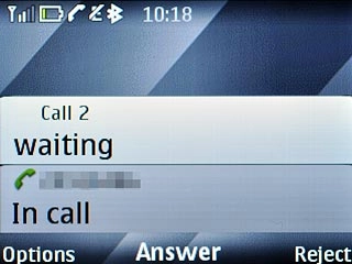 In call is displayed below the active call.
