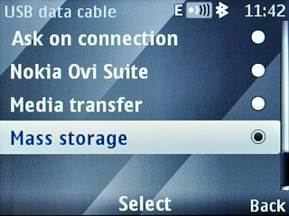 Scroll to Mass storage and press the Navigation key.