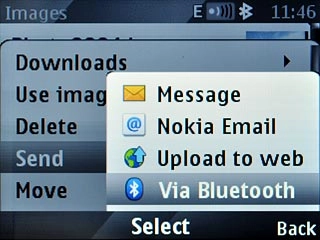 Scroll to Via Bluetooth and press the Navigation key.
