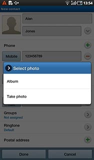 To use a saved picture:Press Album.