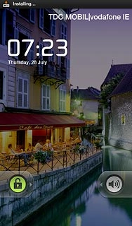 Press and drag the keypad locked icon right.